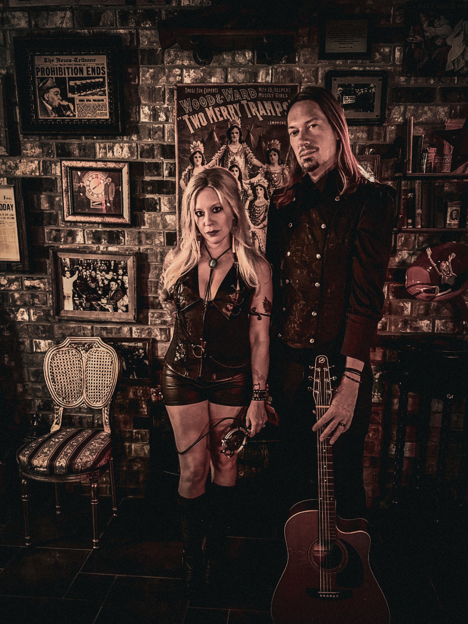 Gallows West portrait standing together in a vintage room with guitar and old photographs