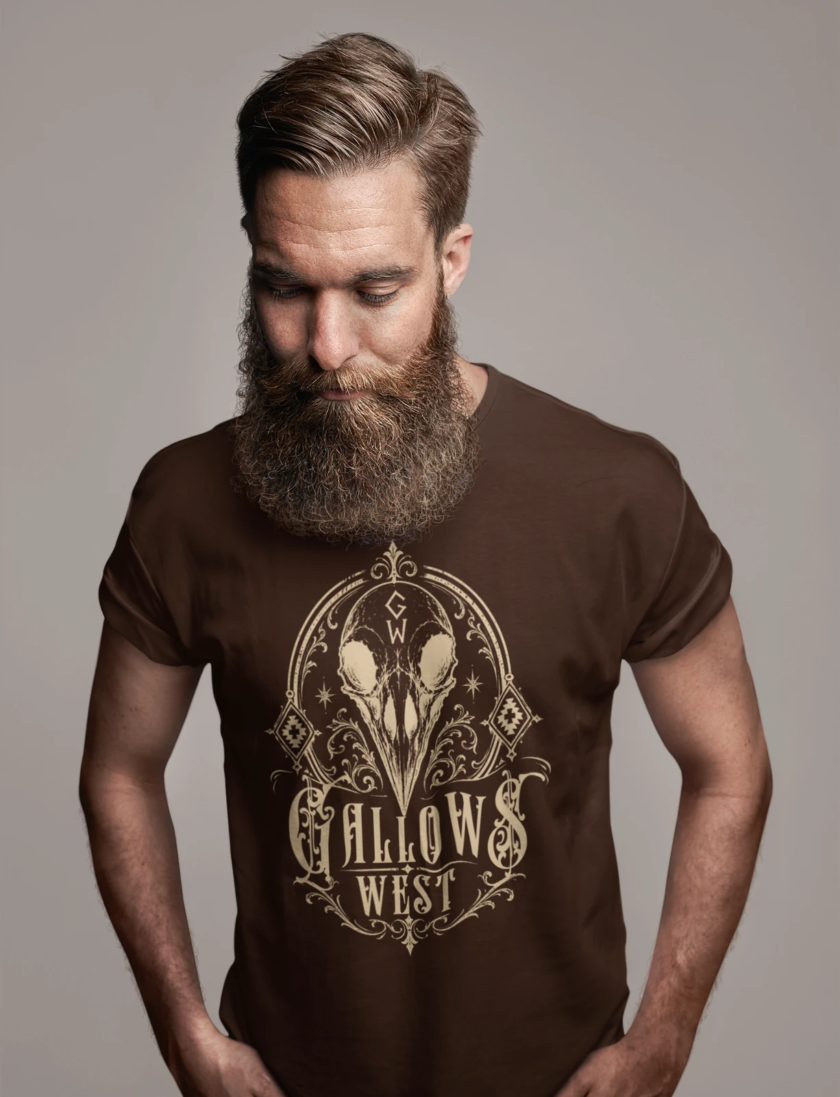 Model wearing a brown Gallows West skull-sigil T-shirt
