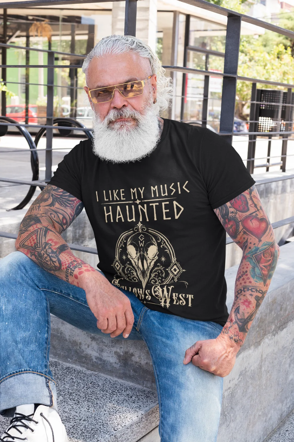 Model wearing a black I Like My Music Haunted Gallows West T-shirt